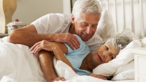 Sexual enhancement for older men: An old couple in bed.